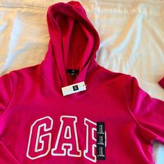 Never Worn Sweatshirt Hoodie By Gap. Size M Bubble Gum Pink Color. Has A Hood And A Front Pocket Gap Sporty Sweatshirt For Fall, Gap Cotton Crew Neck Hoodie, Sporty Gap Sweatshirt For Spring, Sporty Gap Hoodie For Spring, Gap Cotton Sweatshirt With Adjustable Hood, Gap Hoodie Sweatshirt With Adjustable Hood, Gap Casual Sweatshirt For Spring, Gap Casual Hoodie With Adjustable Hood, Gap Casual Spring Sweatshirt