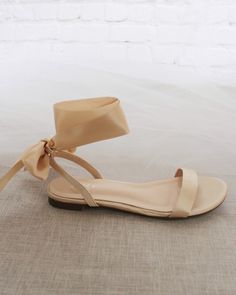 "Classy satin flat sandals with satin ribbon ankle tie. Effortless yet adorable to wear on your favorite occasion. Can be pair with dress or casual look. DETAILS: COLORS AVAILABLE: Ivory, White, Pink, Light Blue, and Champagne UPPER: Synthetic upper and lining MATERIALS: Mandmade outsole STYLE NAME: MADDY Not sure of which size to purchase? Shoes measurements are as follow: (Please note measurements taken the length of inside of shoe from toe to heel) KIDS SIZE: Size 9 - 7\" Size 10 - 7.20\" Siz Fall Wedding Shoes, Kids Heels, Women's Slip Ons, Bridal Flats, Girls Flats, Pointy Toe Flats, Bridesmaid Shoes, Wedding Sandals, Womens Wedding Shoes