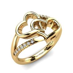 a gold ring with two hearts and diamonds