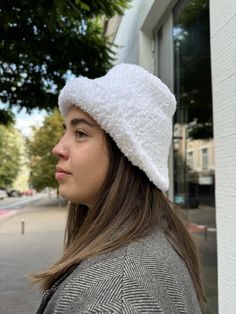 Meet our most cozy teddy hat! It has a rounded shape that exudes warmth and comfort. The textured fabric of the hat adds a tactile dimension to the overall look, highlighting its artisanal quality. Such a fashionable hat will not only keep you warm in the cold seasons, but also emphasize your style and individuality.  MATERIALS and FEATURES This hat is crafted from soft, plush material (100% polyester) that provides excellent insulation, keeping your head warm in cold weather. Pay attention to t Cheap White Acrylic Yarn Hat, Teddy Hat, Winter Hat Crochet, Winter Bucket Hat, Bonnet Au Crochet, Bonnet Crochet, Winter Event, Warm Winter Hats, Hat Crochet