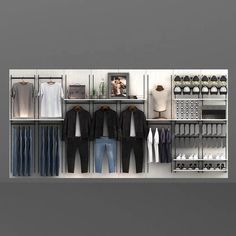 an organized closet with clothes hanging on the wall