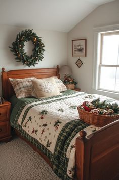 a bedroom with a christmas wreath hanging on the wall and a bed in front of it