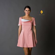 "A beautiful pink dress featuring a fit and flare silhouette, mini length, and asymmetrical neckline with white collar. - asymmetricak neckline with white collar , - fit and flare silhouette - mini length - short sleeves with white cuffs - concealed back zipper closure Color: pink Fiber: cotton - 95% , 5% elastane For Size S (US 8): dress length - 33,5\" / 85 cm Our model wears size S (US 8) and is 171cm/5'6\" tall. You may feel free choosing the size. Just send us your measurements (bust, waist Pink Fit And Flare Dress, Skater Dresses Casual, Pink Cotton Dress, Cocktail Mini Dress, Vintage Dresses 50s, Pink Fits, Flared Dress, Mini Skater Dress, Dress Cocktail