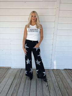 Gorgeous black denim straight leg jeans with rhinestone star details Model is 5'7" with a 28" waist, 34" bust, and 36" hips wearing a 7 Rhinestone Jeans, Star Jeans, Black Rhinestone, White Tank, Jeans Black, Pants Outfit, Black Denim, Straight Leg Jeans, Leg Jeans