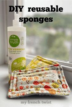 a bottle of diy reusable sponges next to two cloths on a window sill