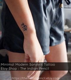 a person with a small tattoo on their arm