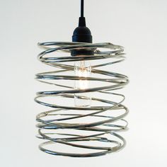 a light that is hanging from a wire with a bulb on it's side