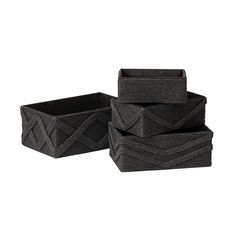 three black baskets sitting on top of each other