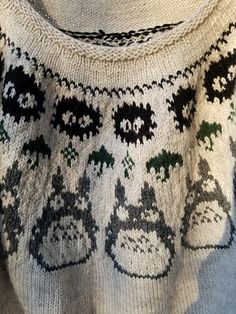 an ugly sweater is hanging on the wall