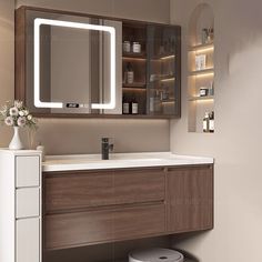 a bathroom vanity with lighted mirror above it