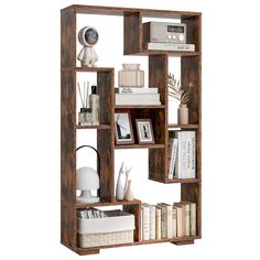 an open book shelf with books and other items on it's shelves, against a white background