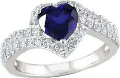 Silver Sapphire Heart Cut Ring For Formal Occasions, Silver Heart Cut Sapphire Ring In Cubic Zirconia, Heart Cut Sapphire Ring With Cubic Zirconia Center Stone, Elegant Blue Heart-shaped Sapphire Ring, Heart-shaped Sapphire Ring For Gift, Heart Engagement, Heart Engagement Rings, White Sapphire, Sterling Silver Heart