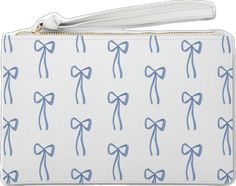 a white wallet with blue bows on the front and bottom, along with a zippered closure