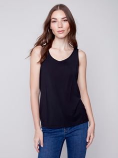 Description Stock up on this versatile tank top for women – it’s reversible, meaning you can wear it with the front scoop neckline, or the other side’s V neckline. New day, new shirt! Available in all the must-have neutrals. Go back to basics in this Black camisole for women. Front crew neck, back V neckline Reversible women’s top Relaxed fit Why we love it Made from the cellulose of bamboo, you’ll love the silky, soft feel of this women’s camisole. It’s the perfect layering tank top, and it’s e Everyday V-neck Top With Built-in Bra, V-neck Top With Built-in Bra For Everyday, Versatile Tops With Built-in Bra For Layering, Everyday Scoop Neck Top With Built-in Bra, Versatile Scoop Neck Tank Top For Everyday, Basic Tops With Built-in Bra, Versatile Scoop Neck Tops For Layering, Versatile Tops With Built-in Bra And Scoop Neck, Everyday Versatile Camisole