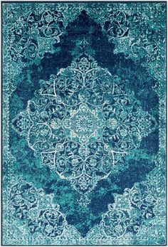 a blue rug with an ornate design on the top and bottom, in shades of teal