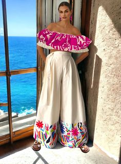 Multicolor Otomi one size fits most Wide Leg palazzo pants - skirt Pants ✔️ embroidery front only. Please if you want embroidery all around, convo 💌 me to quote you total price. 👋🏼 blouse is sold separately Each garment is handmade unique, unrepeatable. Otomi designs may vary from one size to the other. But they all are hand designed and hand embroidered by the wonderful otomi indigenous artisans from Mexico. Impressive piece of art, hand embroidered by indigenous people from Otomi Culture!! Please consider placing your order very fast. I will email you new pictures if the one displayed is sold at our shop before you place the order. This is an authentic, awesome, handcrafted needlework of indigenous families from Tenango de Doria.  ✿ Please click to this link so you can see how a #Tena Modern Mexican Clothing, Anthropology Fashion, Mexican Fashion Modern, Mexican Clothing Style, Mexican Traditional Clothing, South American Style, Mexican Skirt, Mexican Graduation, Pants Embroidery