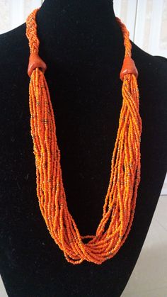 Monogram Necklace | Custom Necklace | Everyday Necklace | Wholesale Necklaces | Dainty Necklace | Mothers Gift | Daughters Gift This statement necklace is made from  fine beads.Main Color - Orange.Available in different colors.Feel free to send me a convo or e-mail for any clarification or more information.Thank you for visiting, Orange Large Beaded Necklace For Festivals, Festival Orange Large Beaded Necklaces, Festival Orange Large Beads Necklace, Festival Orange Large Beaded Necklace, Traditional Multi-strand Faceted Bead Necklace, Colorful Beaded Orange Necklace For Festivals, Colorful Orange Beaded Necklaces For Festivals, Orange Wooden Beads Jewelry For Festival, Orange Beaded Necklace For Festivals