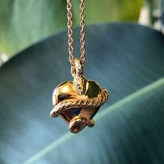 Wise Heart Gold Charm Necklace - ASTOR & ORION Ethically Made Jewelry Serpent Jewelry, Heart Charm Necklace, Beautiful Snakes, Heart Pendant Gold, Gold Charm Necklace, Gold Heart Necklace, Silver Heart Necklace, Ancient Symbols, Original Jewelry