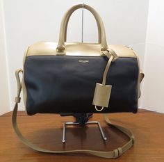 YSL Saint Laurent Classic Leather Duffle Bag New Handbag Authentic #YSLYvesSaintLaurent #Duffle Ysl Saint Laurent, Medium Handbags, Leather Duffle Bag, Leather Duffle, Classic Leather, New Handbags, Kate Spade Top Handle Bag