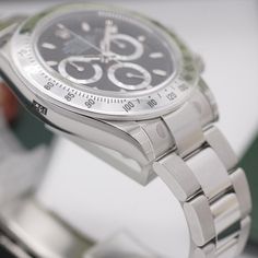 First released in 1963, the Rolex Cosmograph Daytona is one of the most iconic chronograph watches in the world and has deep ties to the world of motorsports. Starting life out as a manually-wound chronograph made for racecar drivers and known simply as Cosmograph, Rolex later renamed the watch in 1965 in honour of becoming the official timekeeper of the famous Daytona NASCAR race. For a long time the watch was considered a niche product in the Rolex catalogue and sold in relatively small number Daytona Nascar, Rolex Cosmograph Daytona, Cosmograph Daytona, Nascar Race, Sport Automobile, Paul Newman, Nascar Racing, Watch Model