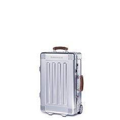 Not all aluminum cases are the same. Built for the elite traveler. Accented with luxurious Italian vegetable tanned leather handles on the top and side panels. Features 2 trolley style wheels to allow for maximum carry-on capacity. This aluminum case certainly will turn heads wherever your travels take you! Full 5052 Aluminum Case with Impact Bearing Ridges Reinforced A380 Aluminum Corners A380 Aluminum Wheel Housings A380 Aluminum Trolley Housing Retractable Full-Aluminum Trolley Italian Full-G Luxury Luggage With Top Carry Handle, Luxury Luggage For Daily Use With Luggage Sleeve, Luxury Versatile Luggage With Sleeve, Luxury Top Handle Luggage With Main Compartment, Luxury Hard Shell Functional Cases, Luxury Business Luggage With Top Carry Handle, Luxury Leather Rectangular Luggage, Luxury White Case With Luggage Sleeve, Luxury Versatile Rectangular Luggage