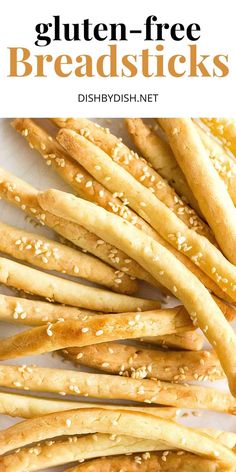 gluten - free breadsticks with sesame seeds on top