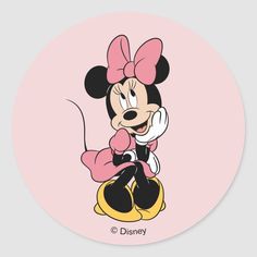 a cartoon character with a pink bow sitting on top of a yellow mouse sticker