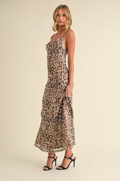 This Feline Fancy Dress showcases a bold leopard print and a stylish cowl neckline. Made with mesh material, it stands out in any crowd. With its maxi length, it is the perfect statement piece for a fancy night out. 95% polyester, 5% spandex Return Policy WE ONLY OFFER STORE CREDIT FOR RETURNS! Feel free to email us at info@shopluxxeapparel.com or DM us with any questions regarding fit, styling, or our return policy in general. To read more into our return policy please click here. Cowl Neckline, Mesh Material, Sunglasses Sale, Accessories Shop, Fancy Dress, Feline, Leopard Print, Return Policy, Night Out