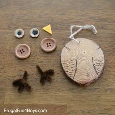 an assortment of buttons and other items on a wooden table with string attached to them