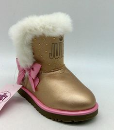 There is an indention on both of the boots in the front Gold Boots, Baby Accessories, Juicy Couture, Baby Shoes, Shoe Accessories, Couture, Boots, Gold, Clothes