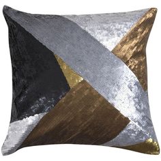 a decorative pillow with metallic and black accents