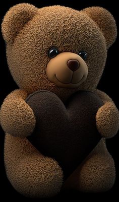 a teddy bear holding a black heart on a dark background with the caption i love you