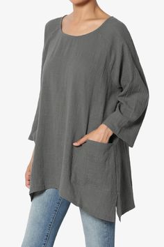 Loose fit tunic top is crinkled cotton-gauze to fall effortlessly over the body. Perfect for warm-weather days, it is subtly gathered for definition. Try it to the weekend with a short or long pants.Lightweight crinkled cotton gauze loose fit tunicRound neck, 3/4 wide raglan sleeevesGathered back yoke, dual patch pockets, high low slit hemFits true to US size, S=Size(4-6), M=Size(8-10), L=Size(12-14), XL=Size(16-18)Model size : 5'3" height, 33" bust, 24" waist, 34" hip, and is wearing a size S10 Fitted Tunic Tops, Casual Kimono, Fitted Tunic, Wide Leg Crop Pants, Layered Shirts, Oversized Tunic, Loose Fitting Tops, Hem Top, Cotton Pullover