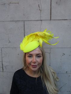 This hat is perfect for special occasions. Featuring feather detailing. The bottom of the hat is approximately 15cm across. This comes on a headband  One off piece - only one available! Many more items like this are available in our shop! Made in the UK - Elegant Flat Cap For Party, Yellow Fitted Costume Hats And Headpieces For Party, Adjustable Flat Cap Mini Hats For Party, Fitted Yellow Party Costume Hats, Adjustable Flat Cap For Parties, Spring Party Mini Hat With Round Crown, Yellow Church Fascinator With Short Brim, Yellow Short Brim Fascinator For Church, Spring Party Hat With Round Crown