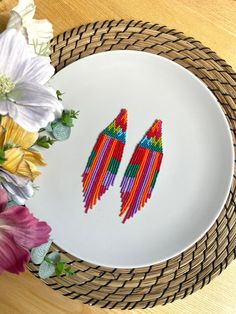 These multicolor seed bead earrings are made from selected Czech beads. Colorful beaded earrings can be an excellent personalized gift for bridesmaids, Mother's Day, Birthdays, Valentine's Day, Wedding day, Christmas, New Year, and for your loved ones. ♡ Length - 6'' (15 Centimeters) ♡ Width - 1'' (2.5 Centimeters) ♡ Quality Czech beads ♡ Stainless steel/925 Silver hooks The colors can slightly differ from the photo because of photography lighting and monitor settings. ♥Gift packaging - FREE! NOTE: Before you pay, please make sure the address in your order matches the address you would like me to ship. ♥ Back to my shop: https://www.etsy.com/shop/BohoBeadRoom My Instagram @boho.bead.room Colorful Tiny Beads Dangle Earrings, Colorful Dangle Earrings With Tiny Beads, Multicolor Drop Earrings With Spacer Beads, Handmade Colorful Beaded Drop Earrings, Handmade Multicolor Tassel Drop Earrings, Multicolor Tiny Beads Earrings For Gift, Rainbow Beaded Drop Earrings, Rainbow Beaded Drop Earrings With Dangling Beads, Colorful Beaded Drop Earrings