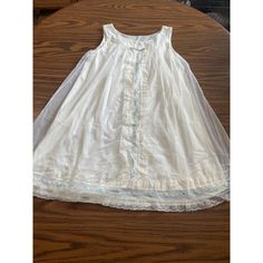 Shadowline vintage cream lace night gown and robe with blue embroidered flowers   Robe has 4 snaps. Has lace and embroidery. No size or care tag. Only says Shadowline and All Nylon Petite. Had to put size, so chose Small. Does have some slight yellowing due to age, otherwise good pre-owned condition. Bin Q9 Check out my store, Old Time Thrift, for more great deals and awesome selections! Spring Lace Nightgown With Lace Patchwork, Cream Nightgown With Lace Trim For Bedtime, Sleeveless Lace Nightgown In Cream, Lace Swiss Dot Dress For Daywear, Sheer Lace Cream Nightgown, Cream Sleeveless Nightgown With Lace Trim, Summer Wedding Nightgown With Lace Patchwork, Spring Wedding Lace Nightgown, Women's Nightgowns