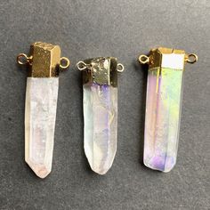 "Listing is for one Angel Aura crystal quartz Point Pendant Connector Stone Size: approx. 13-15mm x 47-55mm Can choose just pendant or pendant with chain necklace Drill Hole: drilled STOCK PHOTOS-- Pendants will vary slightly as to the shape and size of crystal Quartz, making each ring unique. Quartz is a power stone. It has been called the \"Universal Crystal\" because of its many uses. It enhances energy by absorbing, storing, amplifying, balancing, focusing and transmitting." Iridescent Crystal Pendant For Jewelry Making, Iridescent Crystal Pendant Necklace For Jewelry Making, Iridescent Gemstone Pendant Crystal Necklace, Gold Mineral Crystal For Jewelry Making, Angel Aura Crystal, Kindle Cover, Power Stone, Aura Crystals, Photo Pendant