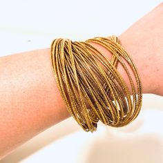 Rolling Bracelet In Bright Yellow Gold (Faux). 2.5 Inch Diameter. Never Worn. Good Statement Piece To Dress Up A Simple Outfit. Bundle 3 Or More Items & Save 15%. Flexible Gold Bracelets For Party, Adjustable Gold Slinky Bracelets, Simple Outfit, Bracelet Bangle, Bright Yellow, Simple Outfits, Womens Jewelry Bracelets, Bangle Bracelets, Rolls