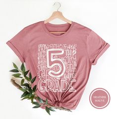 "5th Grade Typography T-Shirt Hi! Welcome to my store, I'm delighted to see you here. My store's main goal is to provide you with premium everyday apparel with the best graphic t-shirts.  DESCRIPTION * Printed and shipped from the USA. * We use state of art printing on soft and quality shirts. * Different size options; crewneck, youth, women's v-neck, toddler, and baby size options.  * Effective customer service and expedited shipping.  * Solid colors are 100% airlume combed and ringspun cotton.  * Heather colors 52/48 cotton/polyester. * Shoulder taping. Side-seamed. Fitted at bicep. Tear-away label. 4.2 oz. SIZES AND COLORS * Please refer to the size charts for measurements before placing an order. * You can compare our numbers to one of your favorite shirts to make sure. * Unisex shirts Grade Level Shirts Teachers, 5th Grade Shirt Ideas, 5th Grade Shirts, 5th Grade Shirt, 2nd Grade Shirt, Middle School Teacher, Second Grade Teacher, Typography T Shirt, Middle School Teachers