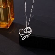 This is a mysterious necklace, Personalized for the moment you love most on a projection necklace! Engraved love never fades, and treasured memory will always be with you. Carry your Little cute photo hidden in the pendant, You can see the photo inside the pendant, or you can use it to illuminate the light and project your photo on the wall. The best dreamy gift for yourself and family, and friends.

Customize Your Picture Projection Necklace

You can freely customize anything you like, including people, pets, scenery, and even symbol, and attach text as a souvenir. Please try to upload photos with high resolution, the higher the resolution, the more obvious the product effect.

Meaningful Accessory & Memorial Gift

This customized projection necklace engraved with your favorite photo will Black Jewelry For Anniversary, Mother's Day Gift, Black Jewelry For Anniversary Gift On Mother's Day, Black Jewelry For Anniversary And Mother's Day, Black Necklaces For Anniversary Gift On Mother's Day, Black Necklaces For Mother's Day Anniversary Gift, Silver Birth Flower Necklace For Anniversary Gift, Silver Birth Flower Necklace For Anniversary, Black Sterling Silver Jewelry For Anniversary Gift, Black Heart Pendant Jewelry For Anniversary