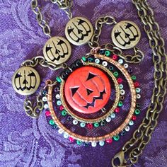 Super Festive Fall/Halloween Pumpkin Charm Necklace. Brass Chain With Pumpkin Accents! Focal Point Charm Is An Orange Pumpkin Face With Colorful Seed Beads Accents. Unique Necklace, You Won't See Anyone Else Wearing This! 59 Adjustable Necklaces For Halloween Costume Party, Bohemian Jewelry For Halloween Party, Bohemian Halloween Party Jewelry, Handmade Jewelry For Halloween Party, Handmade Halloween Party Jewelry, Halloween Metal Necklace With Adjustable Chain, Metal Necklaces With Lobster Clasp For Halloween, Metal Necklace With Lobster Clasp For Halloween, Halloween Party Jewelry With Adjustable Chain