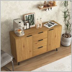 a wooden sideboard with two shelves and pictures on it