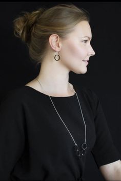 Designer: Elina Mäntylä. Description: Luna necklace has made of Finnish birch. The metal chain is nickel-free jewellery metal. The chain is adjustable. Elegant and modern necklace for everyday use or festive occasions. Pair with Luna or Halo Earrings. Color: Wood. Handmade in Finland. Valona is a Finnish award-winning design company led by designer Elina Mantyla. Valona's style is minimalistic and elegant, yet stays true to its roots in the Nordic nature and traditions. Valona means "as light" i Luna Necklace, Nordic Nature, Necklace For Everyday, Modern Necklace, Nickel Free Jewelry, Halo Earrings, Modern Necklaces, Black Necklace, Earrings Color