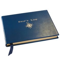 a blue book with the words ship's log on it