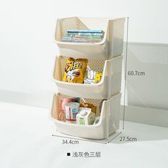 three bins are stacked on top of each other in the shape of a basket