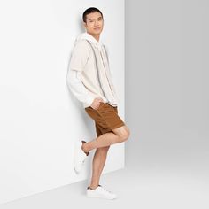 Regular-fit ribbed shorts in a solid hue from Original Use™. Made from 100% cotton with a length that hits above the knee. A full elastic waistband with a front drawstring offers a secure and customizable fit, while two side pockets and two back patch pocket complete the design with functional flair. If you're not satisfied with any Target Owned Brand item, return it within one year with a receipt for an exchange or a refund. Original Use™: Always the next evolution. Casual Bermuda Shorts For Spring Loungewear, Casual Stretch Cotton Bermuda Shorts, Sporty Cotton Bermuda Shorts For Spring, Stretch Bermuda Shorts Casual Style, White Fitted Bermuda Shorts Casual, Fitted Casual Shorts, Ribbed Shorts, All In Motion, Back Patch