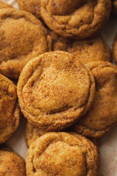 a pile of cinnamon cookies sitting on top of a table