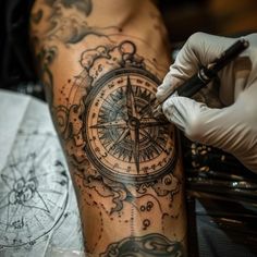 Skilled tattoo artist creating a compass tattoo on a client's arm in a dimly lit tattoo studio. Compass Tattoo Design, Compass Design, Design Tattoo, Tattoo Machine, Compass Tattoo, A Tattoo, Tattoo Artist, Tattoo Studio, Arm Tattoo