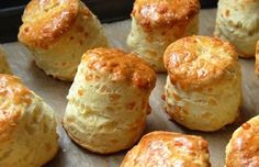 some biscuits are sitting on a baking sheet