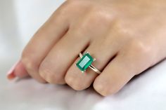 This Sterling Silver Green Onyx Ring features an emerald cut gemstone in a rectangle shape, creating a striking solitaire ring. The sterling silver setting complements the green onyx, making it a suitable choice for a cocktail ring, engagement, or promise ring. This piece combines traditional elements with a unique gemstone to create a distinctive piece of jewelry. ☛ 𝒜𝐵𝒞 - Add Engraving - https://etsy.me/3CLxYPZ ☛ Ring size - Select the size you would like from the drop down menu ♥ Gemstone T Modern Rectangular Emerald Ring For Anniversary, Rectangular Solitaire Emerald Jewelry, Modern Rectangular Emerald Ring For Wedding, Modern Emerald Promise Ring, Rectangular Shape, Modern Green Emerald Ring Rectangular Shape, Rectangular Emerald Solitaire Ring, Green Rectangular Solitaire Jewelry, Rectangular Emerald Ring As A Gift, Fine Jewelry Solitaire Emerald Ring With Rectangular Stone